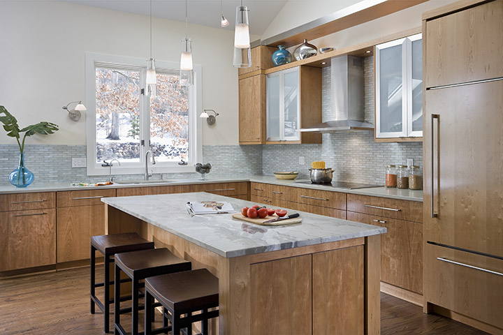 Contemporary kitchen in Minnetonka, Minnesota with modern design and clean quartzite kitchen island.